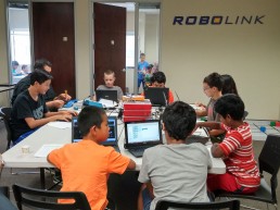 Students around table at Robolink
